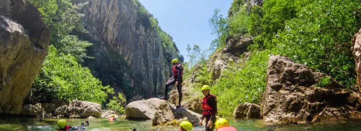 Swimming in Cetina river on canyoning tour