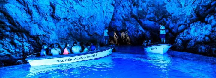 Boats inside Blue Cave in Croatia