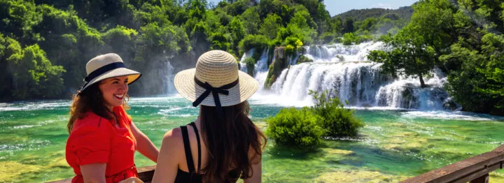 Two girls enjoying Krka Waterfalls