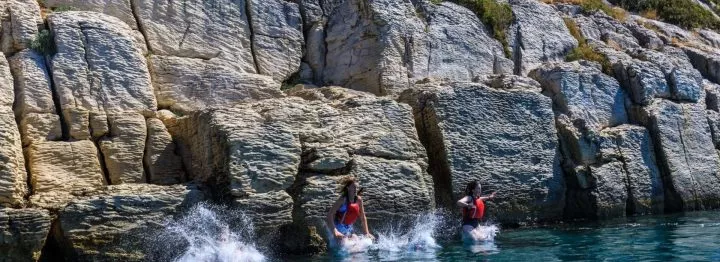 Cliff jumping on kayaking day tour from Split