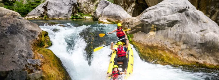 Sliding down the rapids on Cetina river day tour