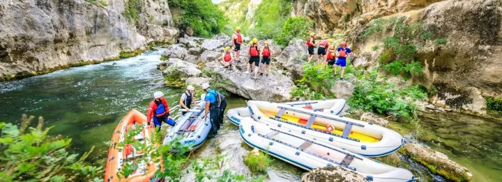 Boats on Cetina river rapid rafting tour
